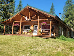Off Grid 2 Bedroom Log Home on 64+ Acres for Sale in Yaak Montana!